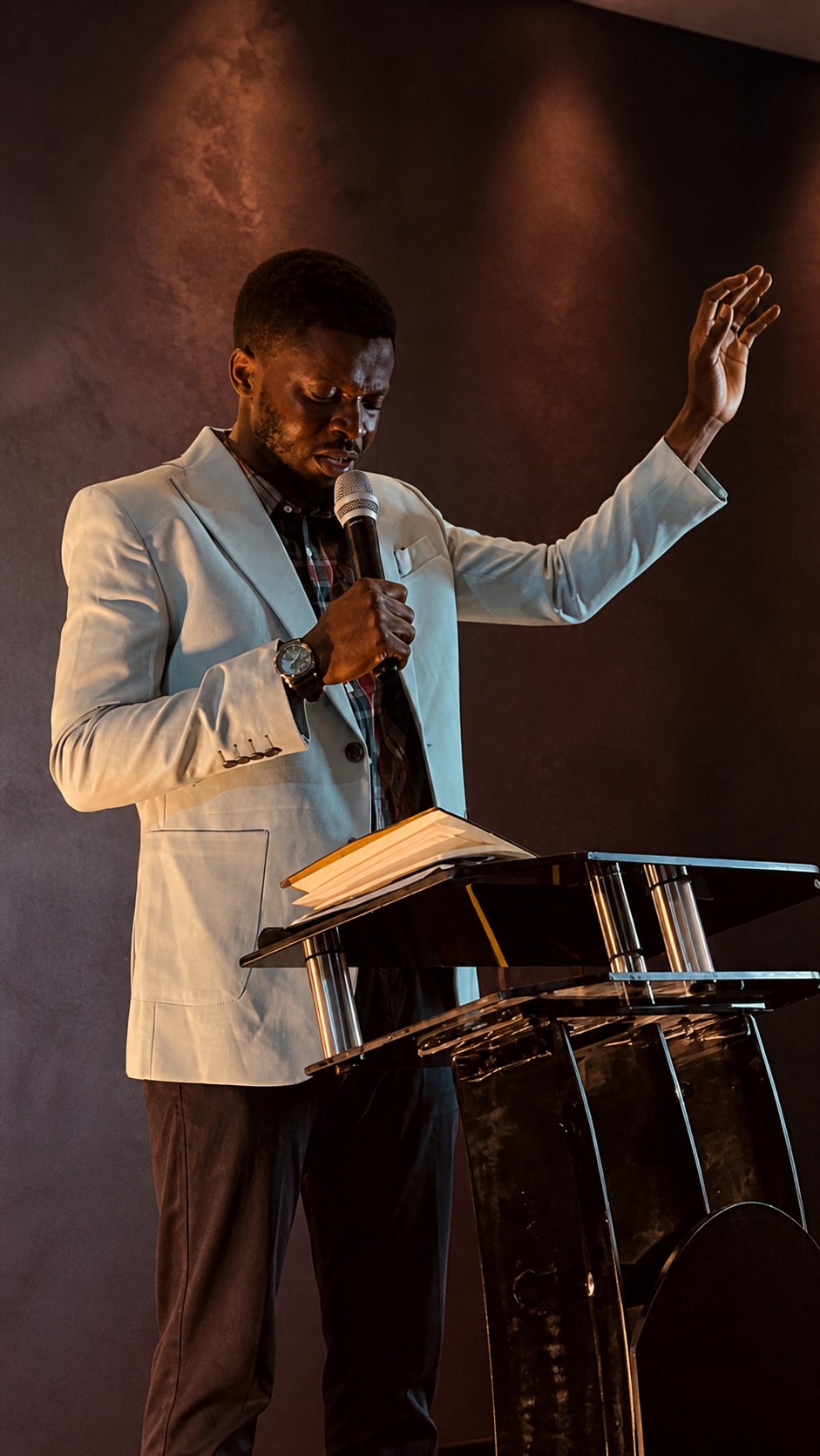 A New Hope pastor leading in prayer